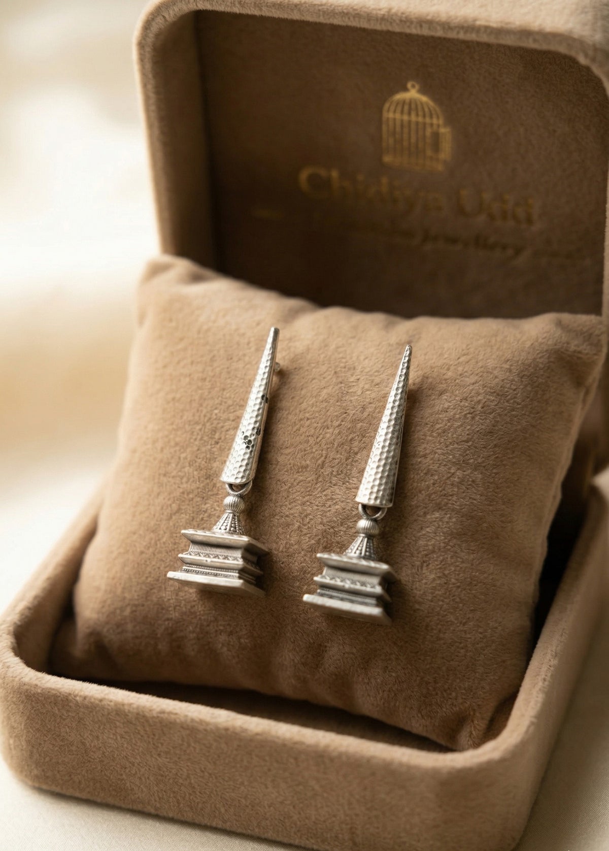 Silver hammered geometric drop earrings with architectural silhouette