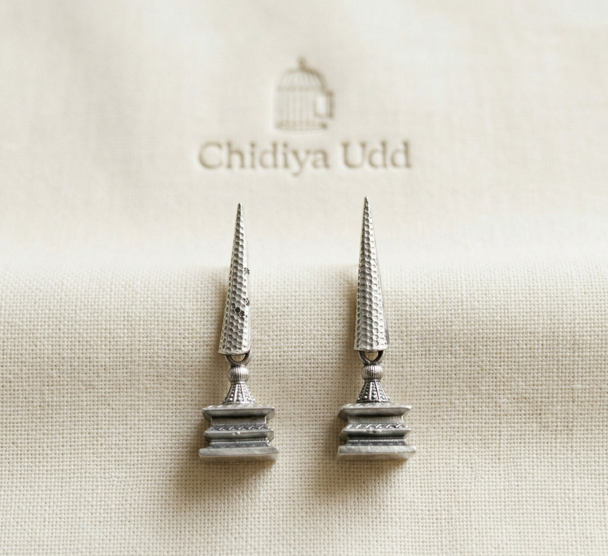 Silver hammered geometric drop earrings with architectural silhouette